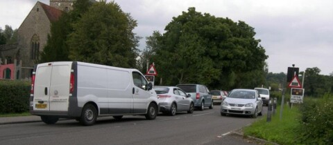 photo of cars on a busy road